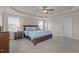 Comfortable main bedroom featuring carpet, natural light, and private bathroom at 2361 Rainy Lake St, Wake Forest, NC 27587