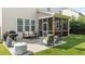 Outdoor patio features grill, comfortable seating, and access to the screened porch at 2361 Rainy Lake St, Wake Forest, NC 27587