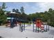 Fun playground area with slides, climbing structures, and ample space for children to play at 2361 Rainy Lake St, Wake Forest, NC 27587
