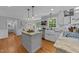 Bright kitchen showcasing custom cabinets, granite counters, and stainless steel appliances at 2409 Beechview Ct, Raleigh, NC 27615