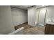 Bright bathroom area includes shower, sink with countertop, and open closet space at 2668 Bodie Currin Rd, Oxford, NC 27565