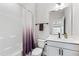 Bathroom featuring a shower with a curtain, a toilet, and a sink with a mirror at 272 High Woods Rdg, Chapel Hill, NC 27517