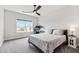Well-furnished bedroom, showcasing natural lighting and a comfortable aesthetic at 272 High Woods Rdg, Chapel Hill, NC 27517