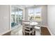 Cozy breakfast nook with access to the outdoor patio and plenty of natural light at 272 High Woods Rdg, Chapel Hill, NC 27517