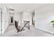 Upstairs hallway with carpet flooring, access to multiple rooms, and natural lighting at 272 High Woods Rdg, Chapel Hill, NC 27517