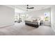 Spacious main bedroom with ample natural light and tray ceilings at 272 High Woods Rdg, Chapel Hill, NC 27517