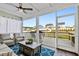 Relaxing screened porch with comfortable seating and views of the backyard at 272 High Woods Rdg, Chapel Hill, NC 27517