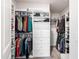 Organized walk-in closet featuring custom shelving, drawers, and ample hanging space at 272 High Woods Rdg, Chapel Hill, NC 27517