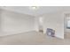 Bright bedroom featuring neutral carpet and light walls with an ensuite bathroom nearby at 30 Sawtooth Oak Ln, Youngsville, NC 27596