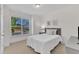 Cozy bedroom featuring a bright window and neutral decor at 30 Sawtooth Oak Ln, Youngsville, NC 27596