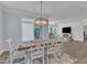 Open concept dining room leading to a living area, providing seamless flow at 30 Sawtooth Oak Ln, Youngsville, NC 27596
