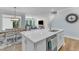 Stylish open-concept kitchen flowing into dining and living areas with modern finishes at 30 Sawtooth Oak Ln, Youngsville, NC 27596