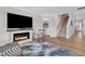 Comfortable living area with a fireplace, creating a warm and inviting atmosphere at 30 Sawtooth Oak Ln, Youngsville, NC 27596