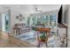 Inviting living room featuring a fireplace and seamless indoor-outdoor flow at 30 Sawtooth Oak Ln, Youngsville, NC 27596