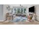 Bright living room with a fireplace and a ceiling fan, creating a relaxing atmosphere at 30 Sawtooth Oak Ln, Youngsville, NC 27596