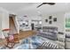 Open concept living space with a view of the kitchen, dining area and staircase at 30 Sawtooth Oak Ln, Youngsville, NC 27596