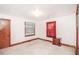 Bright bedroom with white walls, neutral carpet and wood trim throughout, and a small nightstand at 3301 Amherst Rd, Rocky Mount, NC 27804