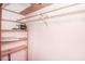 Empty closet with shelving and a clothing rod, ready for organized storage solutions in the bedroom at 3301 Amherst Rd, Rocky Mount, NC 27804
