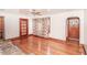 Cozy living room with hardwood floors, vintage-style details, and ample natural light, perfect for relaxation at 3301 Amherst Rd, Rocky Mount, NC 27804