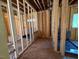 Unfinished living room shows new construction with open floor plan and windows at 332 Inspiration Way, Fuquay Varina, NC 27526