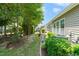Charming backyard with lush landscaping and a private patio space at 340 Orbison Dr, Cary, NC 27519