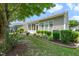 Well-manicured backyard featuring lush greenery and a private outdoor space at 340 Orbison Dr, Cary, NC 27519