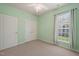 Cozy bedroom featuring a closet and a window with pleasant natural light at 340 Orbison Dr, Cary, NC 27519