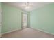 Bright bedroom with a ceiling fan and a window providing natural light at 340 Orbison Dr, Cary, NC 27519