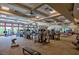 Fully-equipped fitness center with various cardio and strength training machines and ample natural light at 340 Orbison Dr, Cary, NC 27519