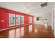 Spacious living room with hardwood floors, bright windows, and open floor plan at 340 Orbison Dr, Cary, NC 27519