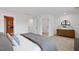 Bright bedroom with a walk-in closet, neutral colors, and modern furniture at 348 Church St # 51, Wendell, NC 27591