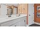 Bathroom featuring dual sinks, stone countertops, and modern fixtures at 352 Church St # 53, Wendell, NC 27591