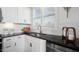 Clean white kitchen cabinets, stainless steel appliances, and subway tile backsplash create a stylish kitchen at 352 Church St # 53, Wendell, NC 27591