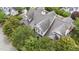 An aerial perspective of a home, enhanced by the lush, surrounding trees at 3923 Napa Valley Dr, Raleigh, NC 27612