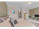 Inviting bedroom features a comfortable bed, soft lighting, and neutral tones for a relaxed atmosphere at 3923 Napa Valley Dr, Raleigh, NC 27612