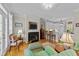 Inviting living area with a fireplace, comfortable seating, and seamless flow into the kitchen at 3923 Napa Valley Dr, Raleigh, NC 27612