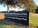 Sign for the North Carolina Museum of Art and the Ann & Jim Goodnight Museum Park at 3923 Napa Valley Dr, Raleigh, NC 27612
