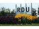 RDU Airport welcome sign with flower bed in front of the airport entrance at 3923 Napa Valley Dr, Raleigh, NC 27612
