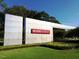 NC State University signage with manicured lawn and landscaping in front of the campus at 3923 Napa Valley Dr, Raleigh, NC 27612