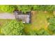 Birds-eye view of the house and surrounding trees and driveway at 4144 Fairport Rd, Kittrell, NC 27544