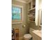 Bathroom with standard toilet and built in storage at 4144 Fairport Rd, Kittrell, NC 27544