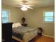 This bedroom has wood floors and great natural light at 4144 Fairport Rd, Kittrell, NC 27544