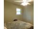 Bedroom with ceiling fan and hardwood floors at 4144 Fairport Rd, Kittrell, NC 27544