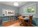 Cozy dining area with bar pass-through to the kitchen, perfect for entertaining at 4144 Fairport Rd, Kittrell, NC 27544