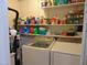 Bright laundry room includes front loading washer and dryer at 4144 Fairport Rd, Kittrell, NC 27544