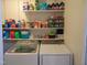 Bright laundry room includes front loading washer and dryer at 4144 Fairport Rd, Kittrell, NC 27544