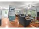 Open-concept living room showcasing ample seating and natural light at 4144 Fairport Rd, Kittrell, NC 27544