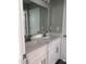 Bathroom featuring a double vanity with white cabinets, granite countertop and a large mirror at 431 Mayview Dr, Creedmoor, NC 27522
