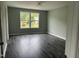 Bright, airy bedroom with large windows at 431 Mayview Dr, Creedmoor, NC 27522