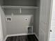 Dedicated laundry area with utility connections and ample storage space at 431 Mayview Dr, Creedmoor, NC 27522